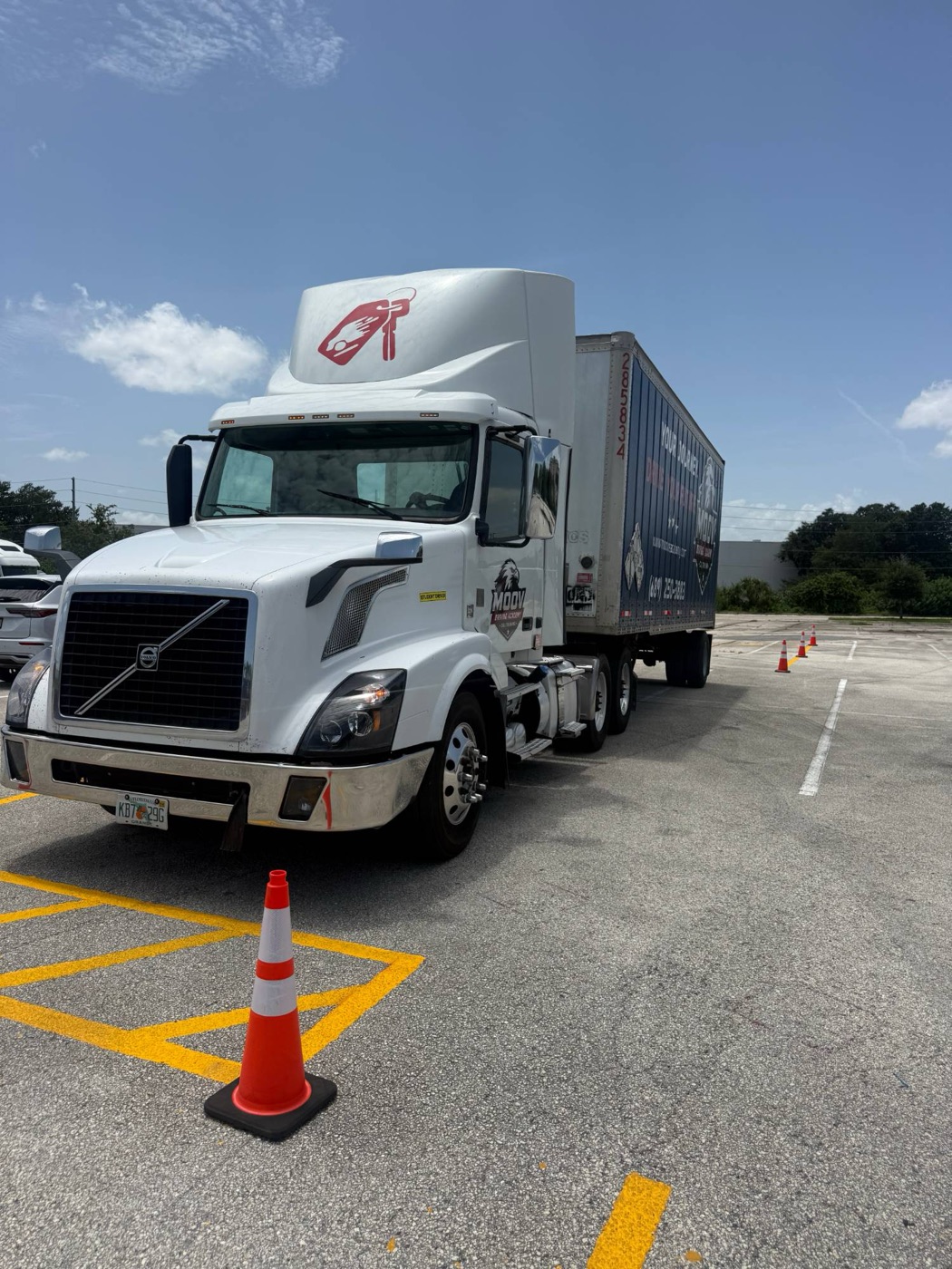 Moov training truck on the range with a cone